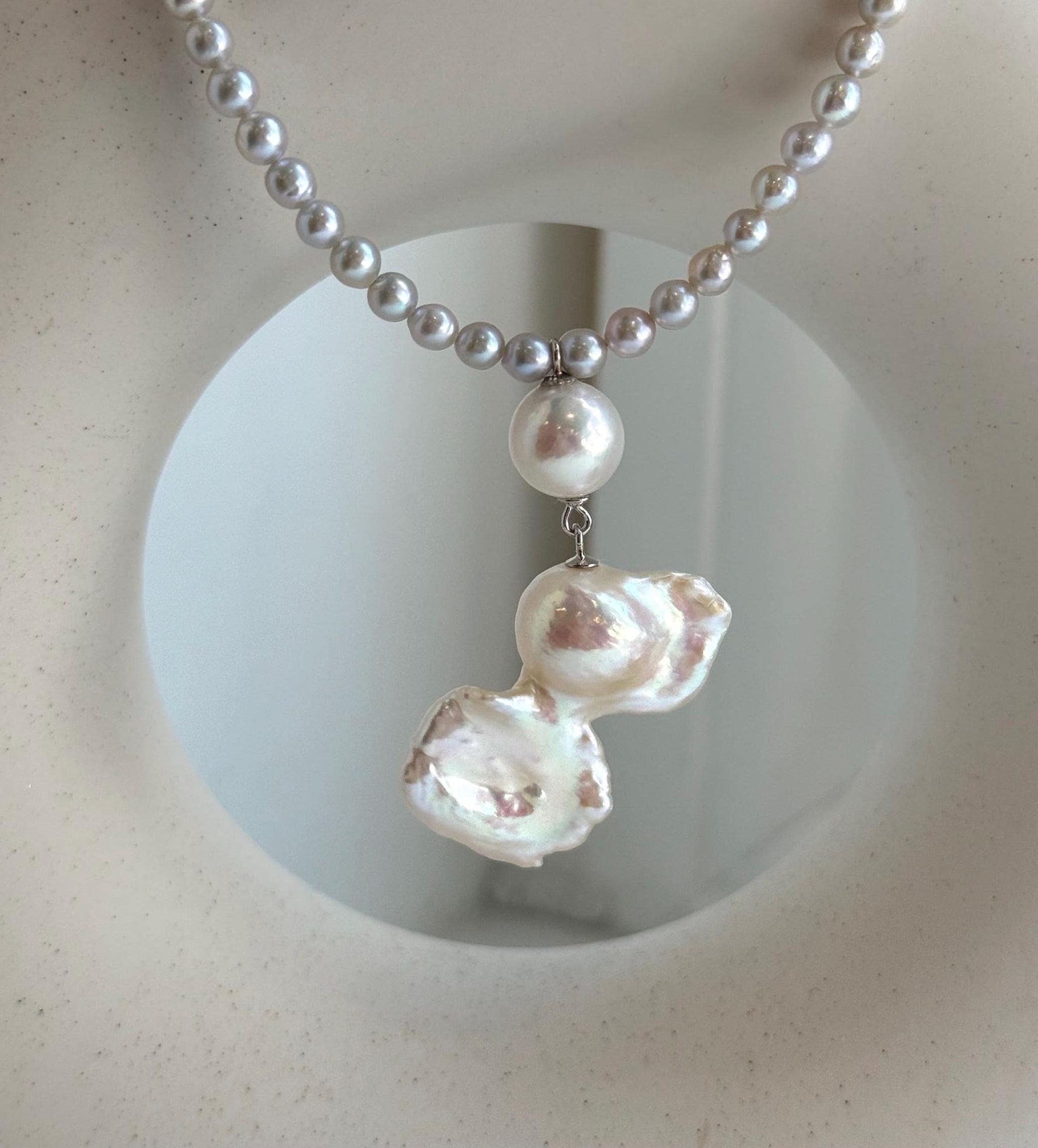 Elly’s Freshwater Large Petal baroque white pearl necklace:Extreme luster mirrored, 19.3x31mm, to 17.9”, S925 silver necklace strand.