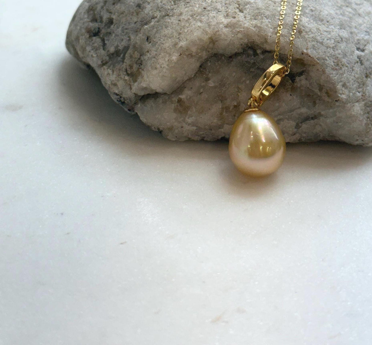 Elly’s 12.9mm South Sea deep Tea Gold ocean Drop Pearl pendant: Extreme luster mirrored. S925 silver w/ gold plated pendant.