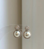 Elly’s 0.2ct Moissanite Akoya ocean pearls earrings: Extreme luster Mirrored, 7.3mm, 1x1.5cm, S925 silver cool earrings.