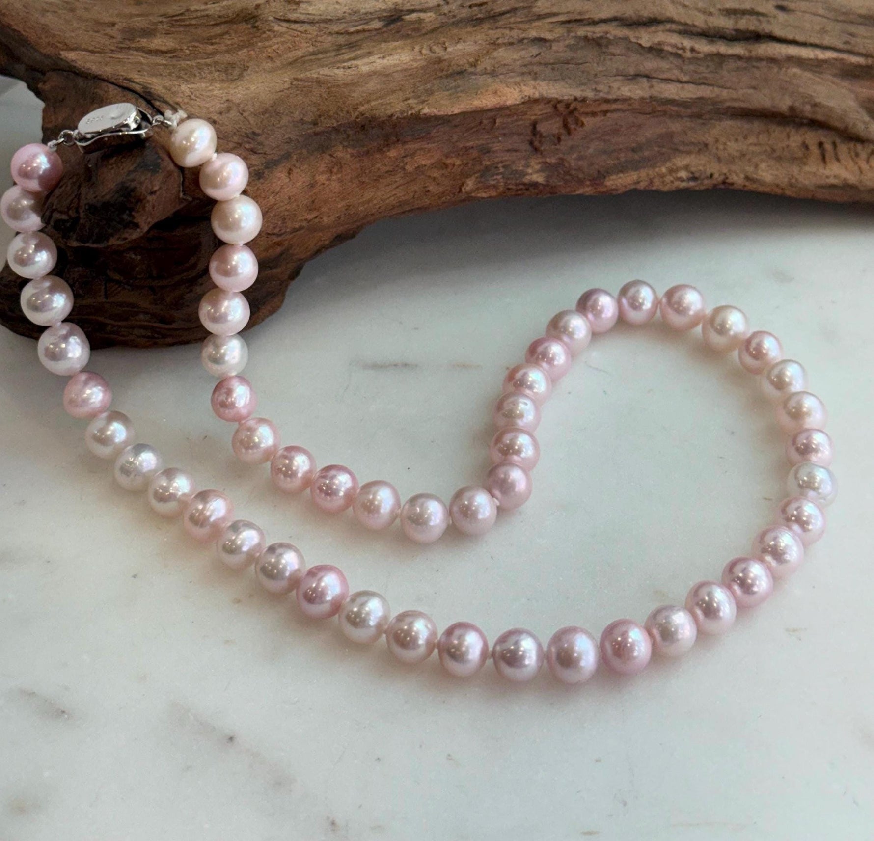 Elly’s 8-9mm Freshwater Pale Pink pearls necklace: Extreme luster mirrored, 18.1”, s925 silver necklace strand.