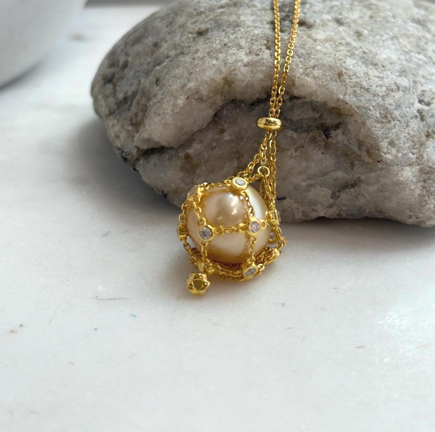 south sea golden ocean pearl net pocket pendant chain set
