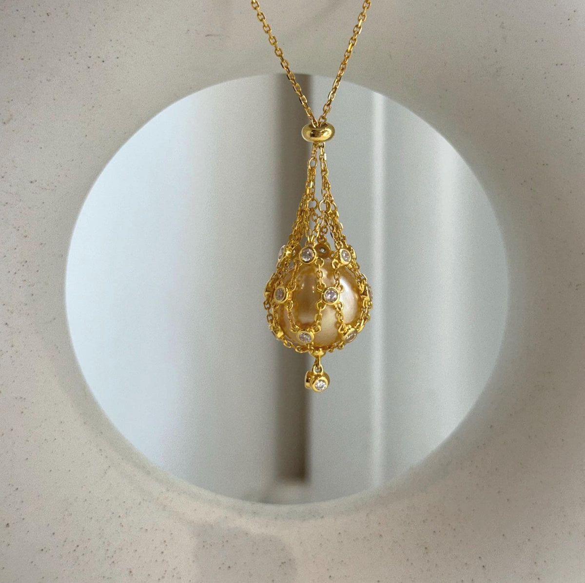 south sea golden ocean pearl net pocket pendant chain set