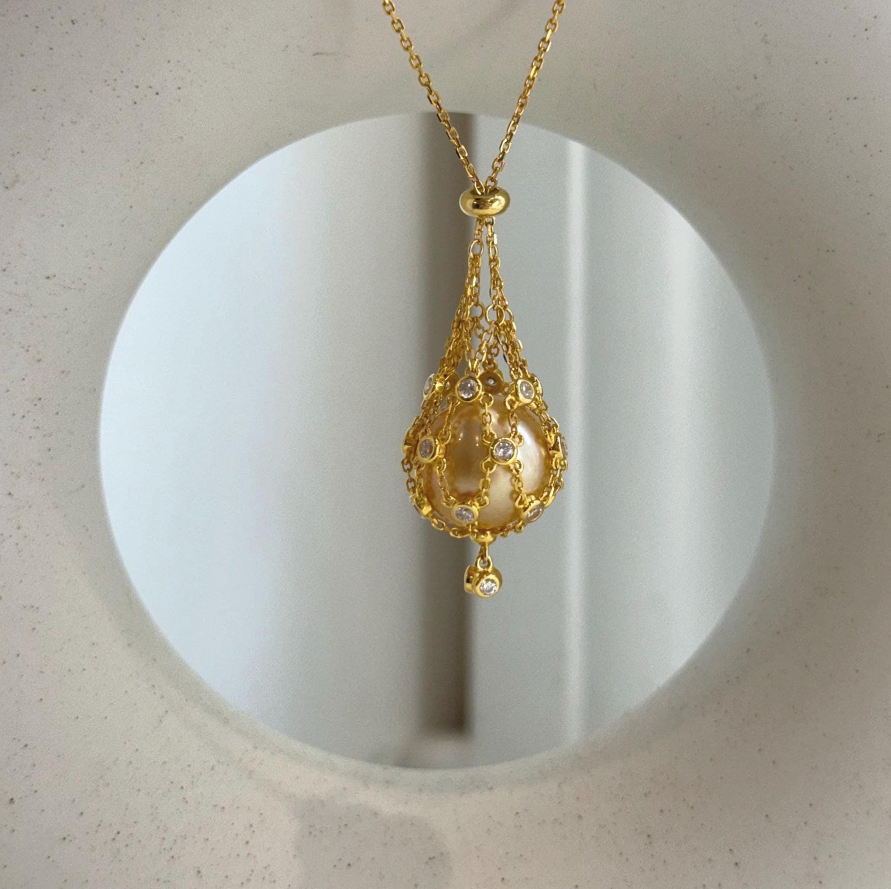 south sea golden ocean pearl net pocket pendant chain set