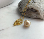 Elly’s 14.1x14.7mm Huge South Sea ultra gold ocean Pearl pendant chain set: Extreme luster mirrored. S925 silver with gold plated pendant.