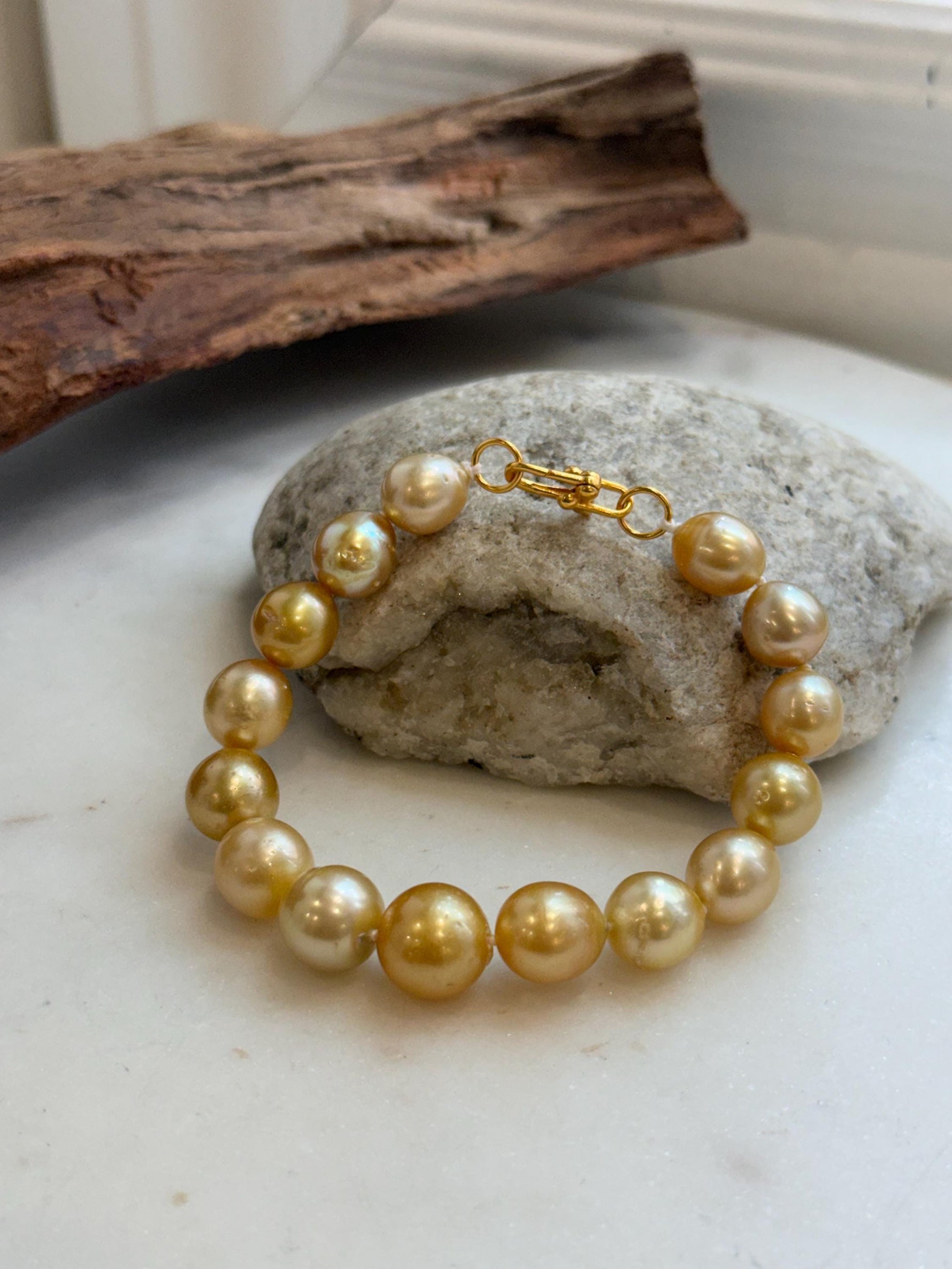 Elly’s 9.8-12.5mm 15pcs Genius South sea golden Ocean Pearls bracelet: Extreme luster, 8.1”, S925 silver bracelet.