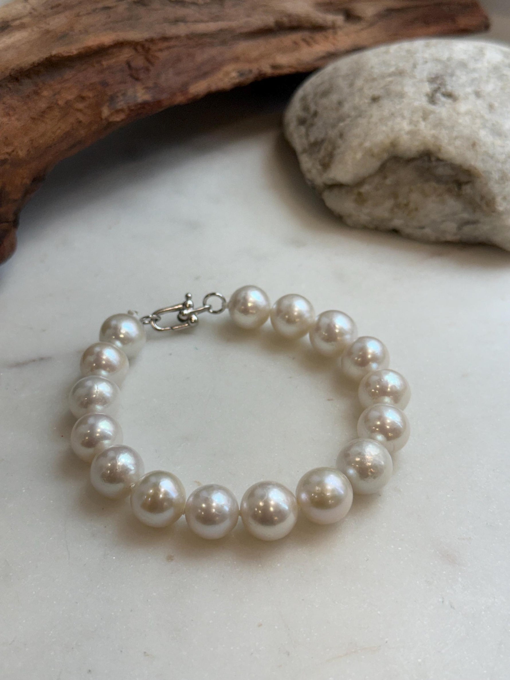 Elly’s 11-12.1mm 16pcs Edison white Pearls bracelet: Extreme luster, 8.1”, S925 silver bracelet.
