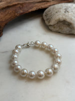 Elly’s 11-12.1mm 16pcs Edison white Pearls bracelet: Extreme luster, 8.1”, S925 silver bracelet.