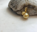 Elly’s 12.5mm South Sea deep Gold ocean Pearl pendant: Extreme luster mirrored, 2.5cm high, S925 silver w/ gold plated pendant.
