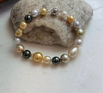 Elly’s Multicolor Ocean Pearls Bracelet: 18pcs South Sea Golden White Tahitian Akoya Pearls, Extreme luster, 7.2-10.4mm, 7.7” knotted