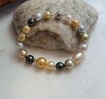Elly’s Multicolor Ocean Pearls Bracelet: 18pcs South Sea Golden White Tahitian Akoya Pearls, Extreme luster, 7.2-10.4mm, 7.7” knotted