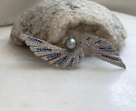 Elly’s 8.5mm Tahitian platinum blue Ocean feather Brooch Pendant 2in1: Extreme Luster mirrored, no chain.