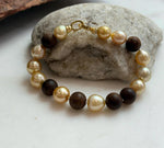Elly’s 11pcs Genius South Sea Golden ocean Pearls Agarwood bracelet: Extreme luster, 8.9-10.5mm, 8.2” knotted.