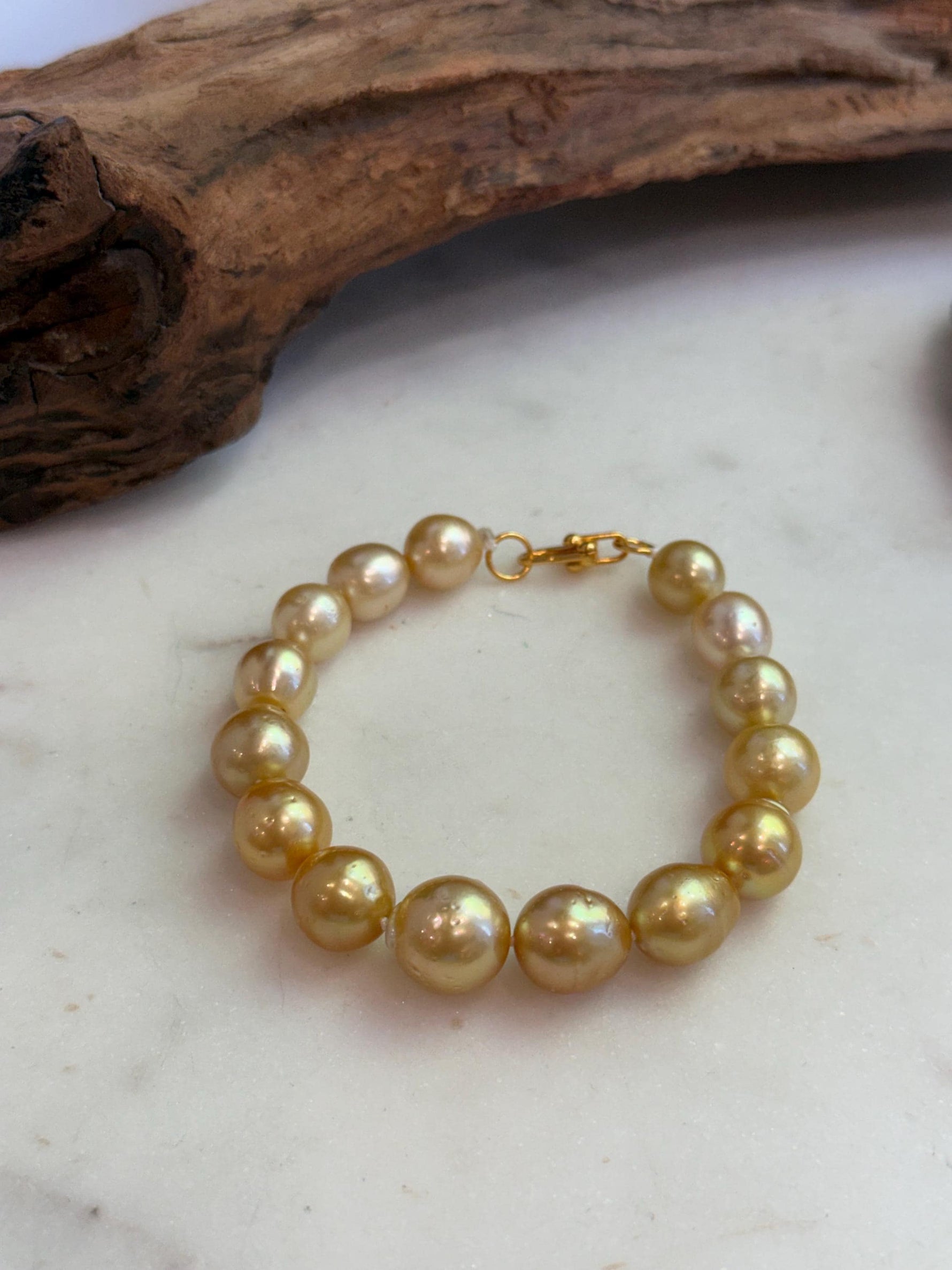 Elly’s 10.4-13.4mm 15pcs Genius South sea golden Ocean Pearls bracelet: Extreme luster, 8.5”, S925 silver bracelet.