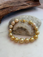 Elly’s 10.4-13.4mm 15pcs Genius South sea golden Ocean Pearls bracelet: Extreme luster, 8.5”, S925 silver bracelet.