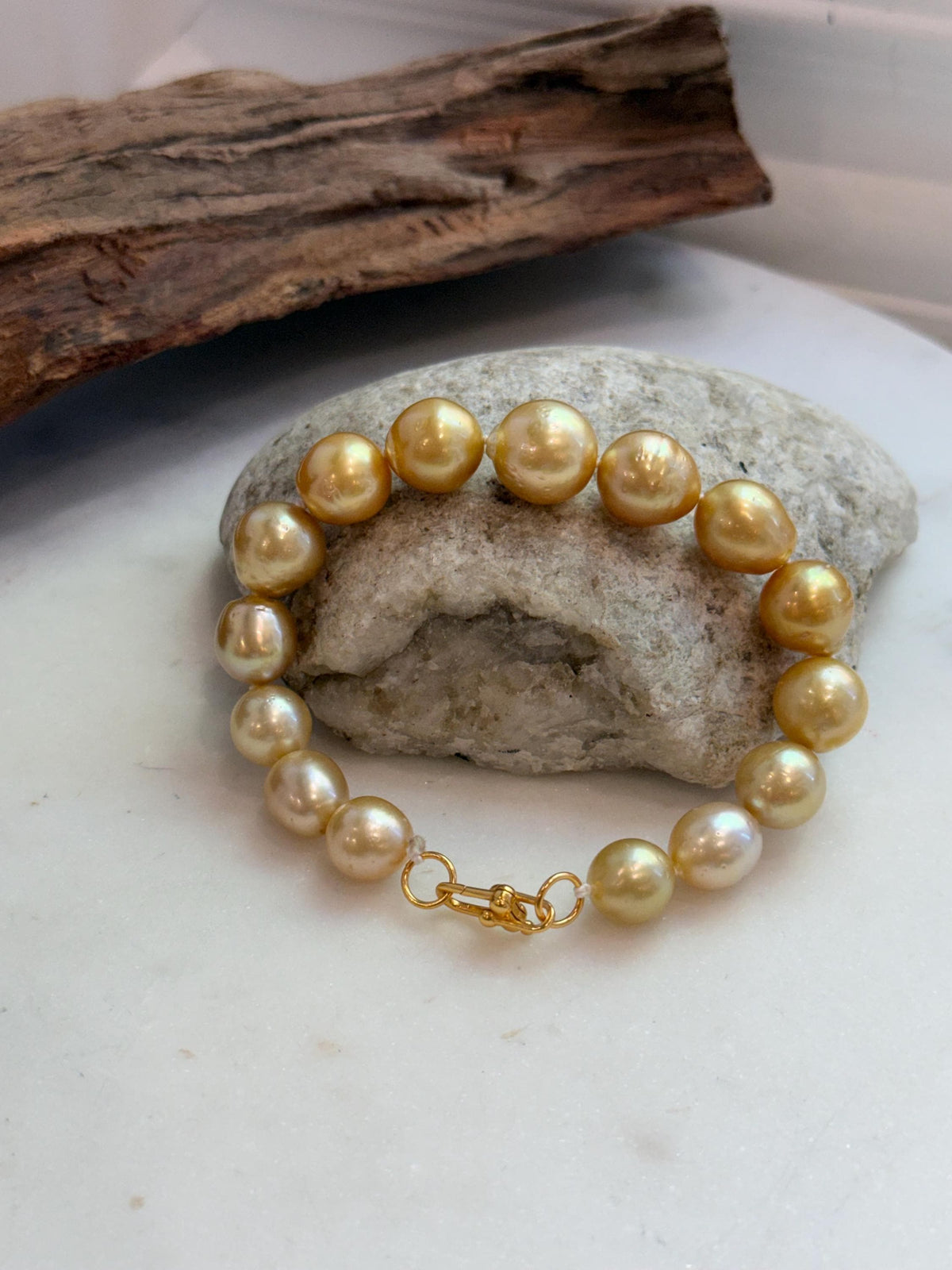 Elly’s 10.4-13.4mm 15pcs Genius South sea golden Ocean Pearls bracelet: Extreme luster, 8.5”, S925 silver bracelet.
