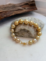 Elly’s 10.4-13.4mm 15pcs Genius South sea golden Ocean Pearls bracelet: Extreme luster, 8.5”, S925 silver bracelet.