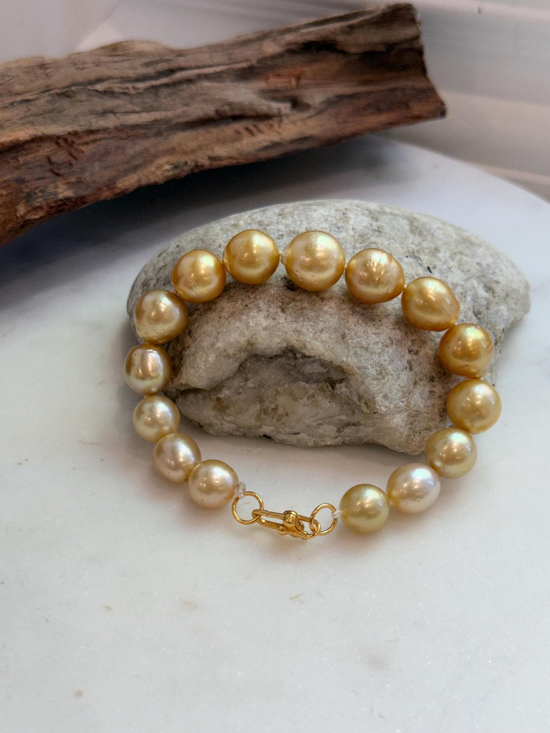 Elly’s 10.4-13.4mm 15pcs Genius South sea golden Ocean Pearls bracelet: Extreme luster, 8.5”, S925 silver bracelet.
