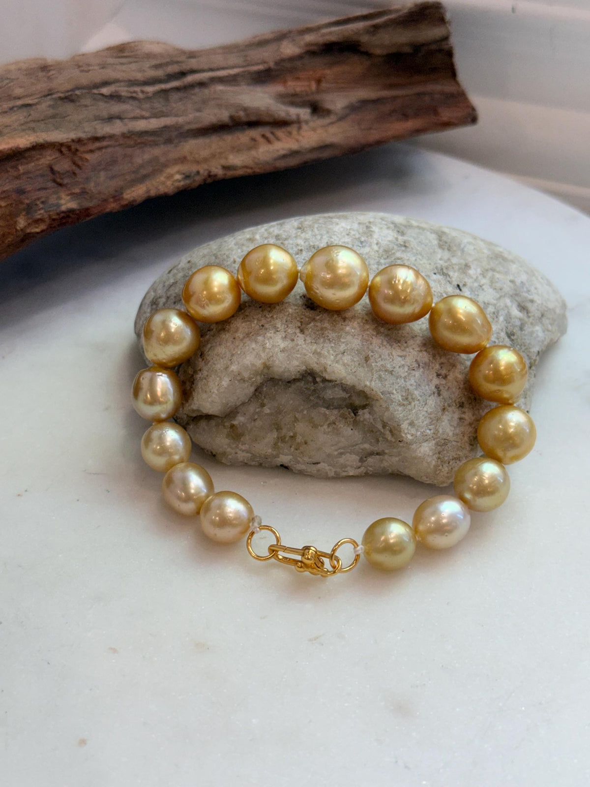 Elly’s 10.4-13.4mm 15pcs Genius South sea golden Ocean Pearls bracelet: Extreme luster, 8.5”, S925 silver bracelet.