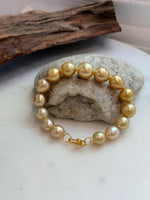 Elly’s 10.4-13.4mm 15pcs Genius South sea golden Ocean Pearls bracelet: Extreme luster, 8.5”, S925 silver bracelet.