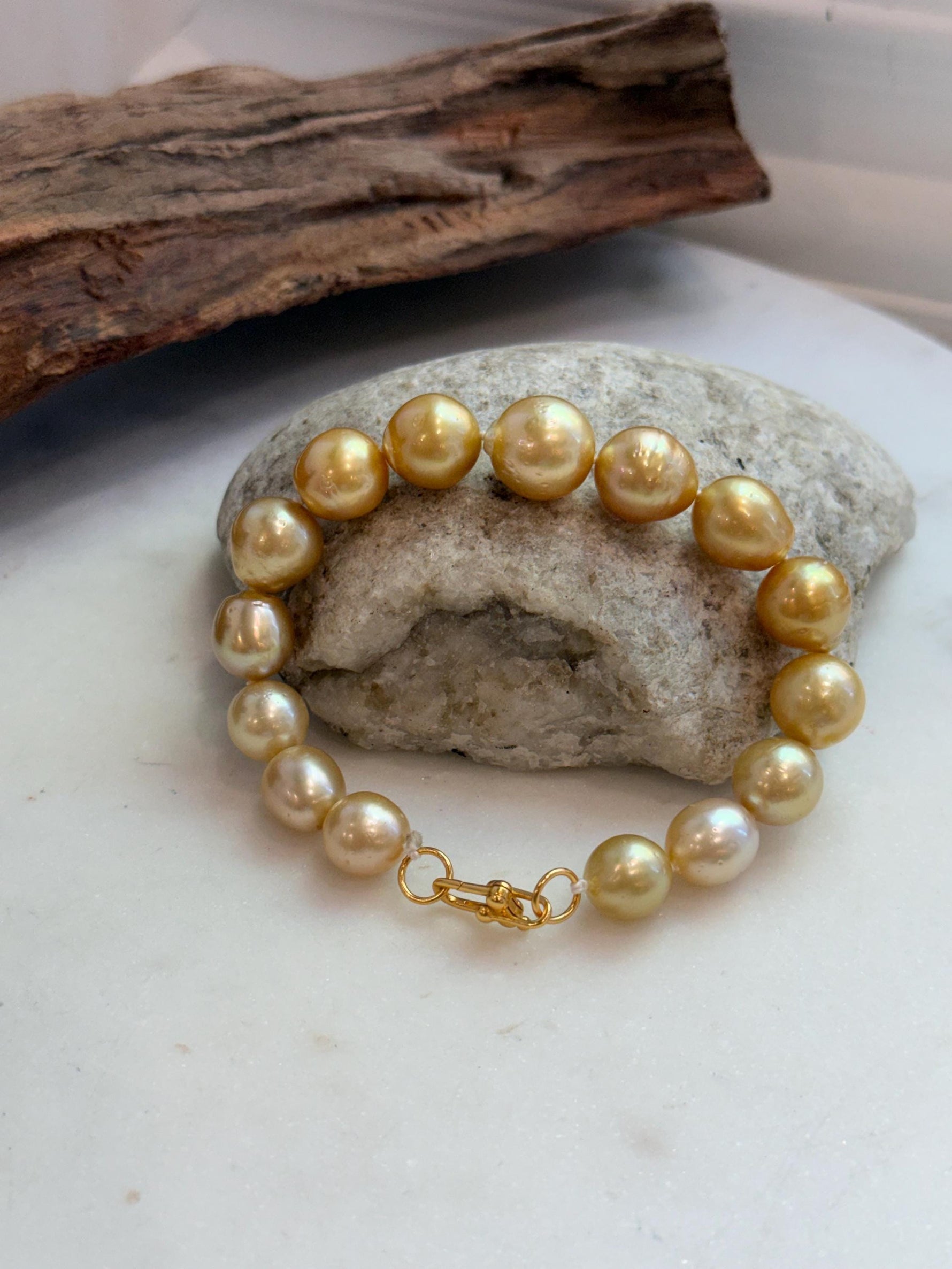 Elly’s 10.4-13.4mm 15pcs Genius South sea golden Ocean Pearls bracelet: Extreme luster, 8.5”, S925 silver bracelet.
