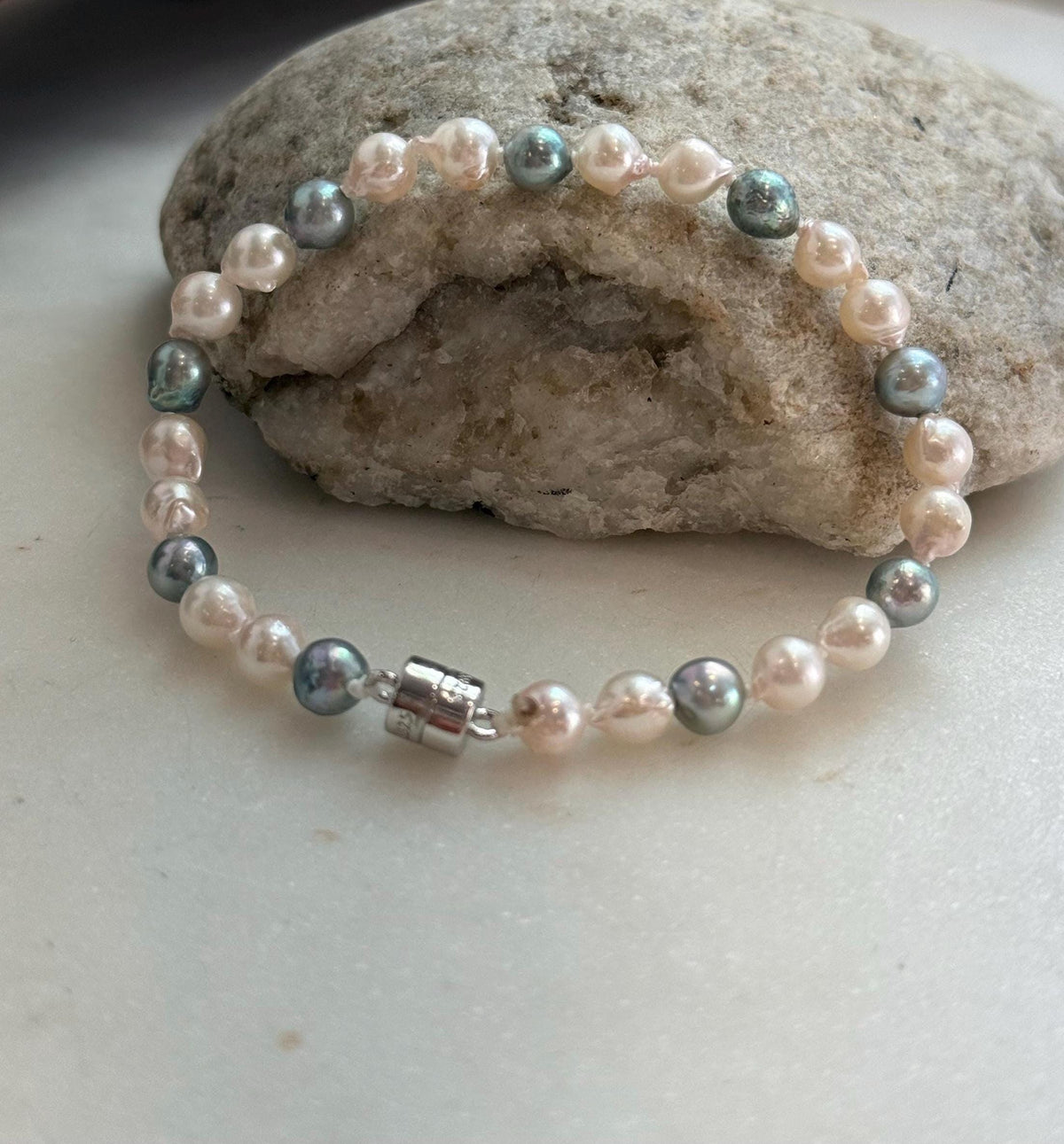 Elly’s 5.5-6mm Akoya Pink blue ocean pearls bracelet:Extreme luster mirrored, knotted, 7.4”, S925 silver bracelet.