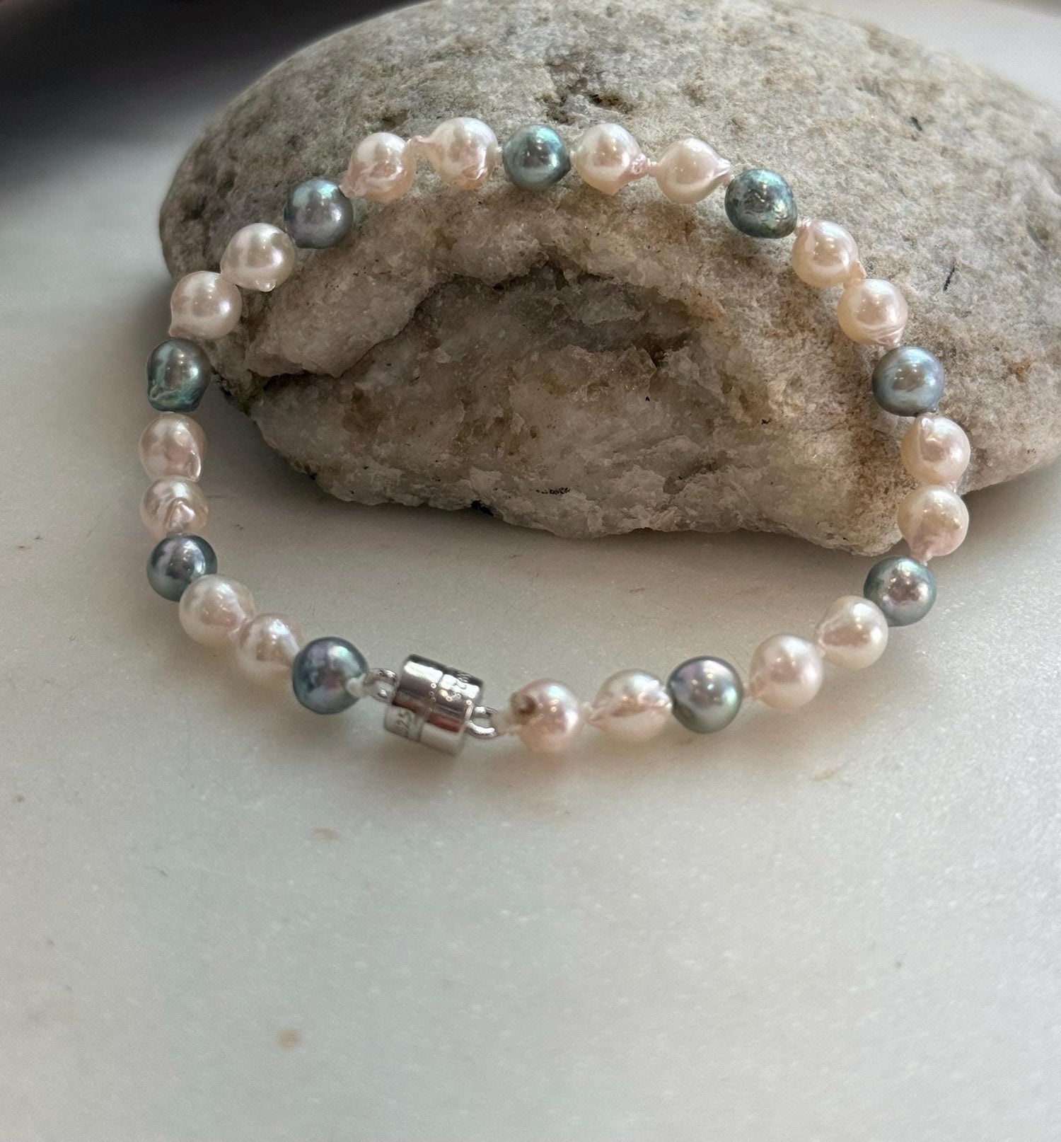 Elly’s 5.5-6mm Akoya Pink blue ocean pearls bracelet:Extreme luster mirrored, knotted, 7.4”, S925 silver bracelet.