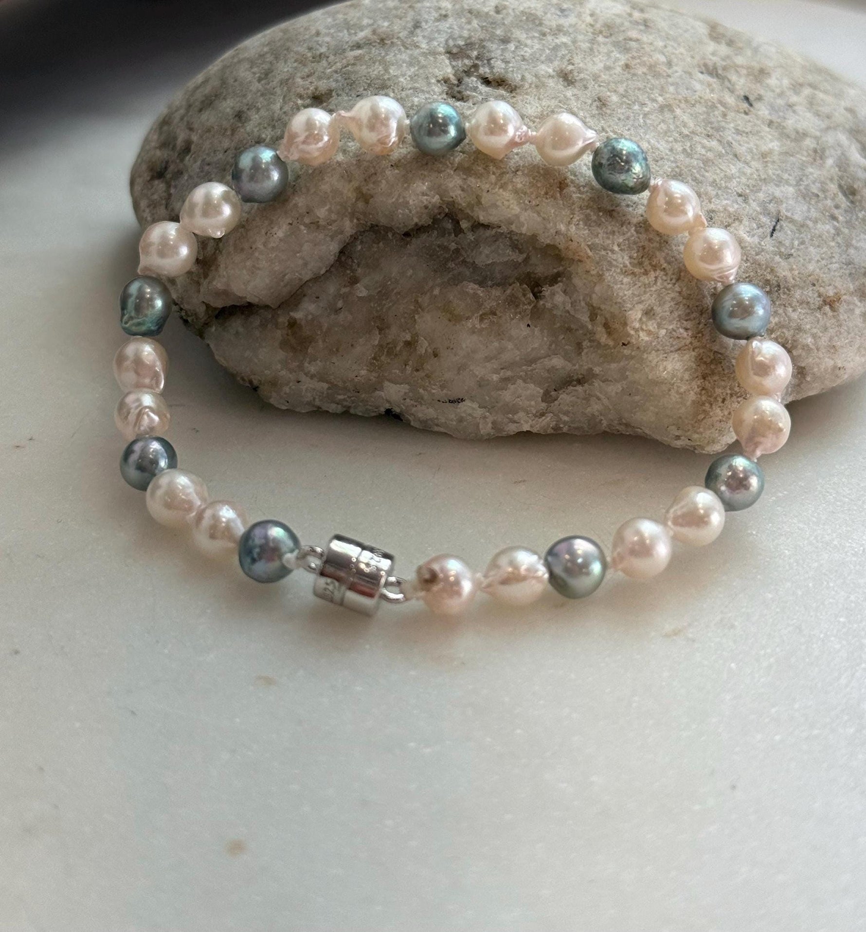 Elly’s 5.5-6mm Akoya Pink blue ocean pearls bracelet:Extreme luster mirrored, knotted, 7.4”, S925 silver bracelet.