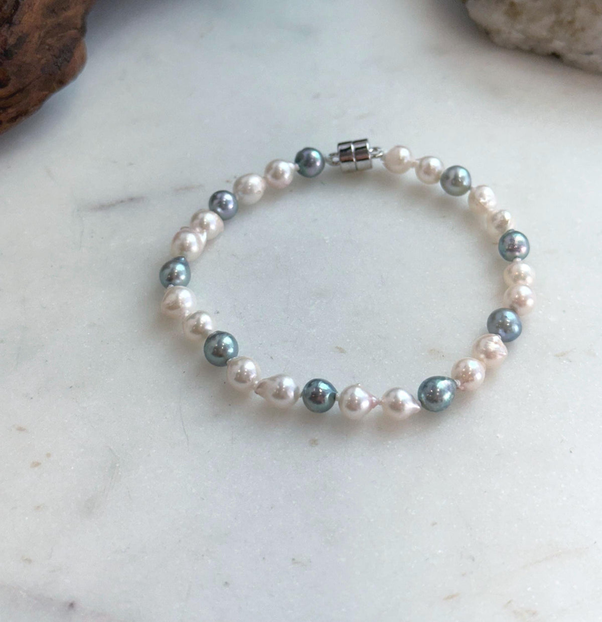 Elly’s 5.5-6mm Akoya Pink blue ocean pearls bracelet:Extreme luster mirrored, knotted, 7.4”, S925 silver bracelet.