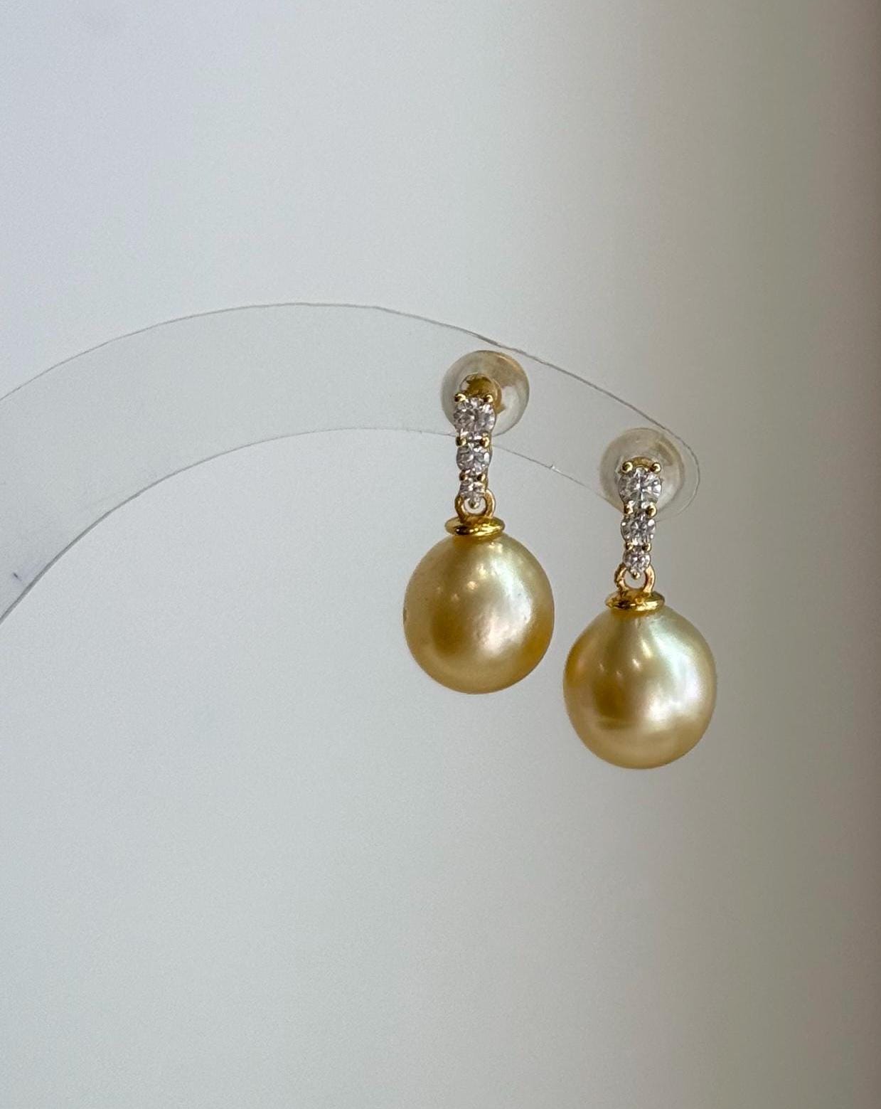 Elly’s 9.3mm South sea ultra golden ocean Pearls Earrings: Extreme luster mirrored, 1.8cm high, S925 silver earrings.