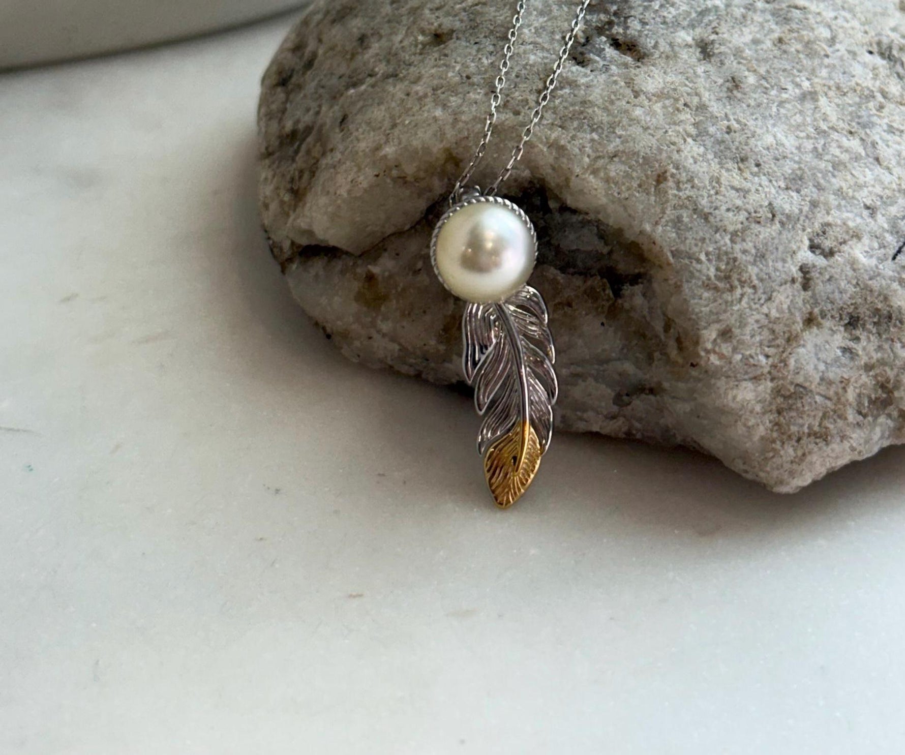 Elly’s 9.3mm Genius South sea ivory Ocean Pearl leather Pendant: Extreme luster mirrored, 1x3cm, S925 silver pendant.