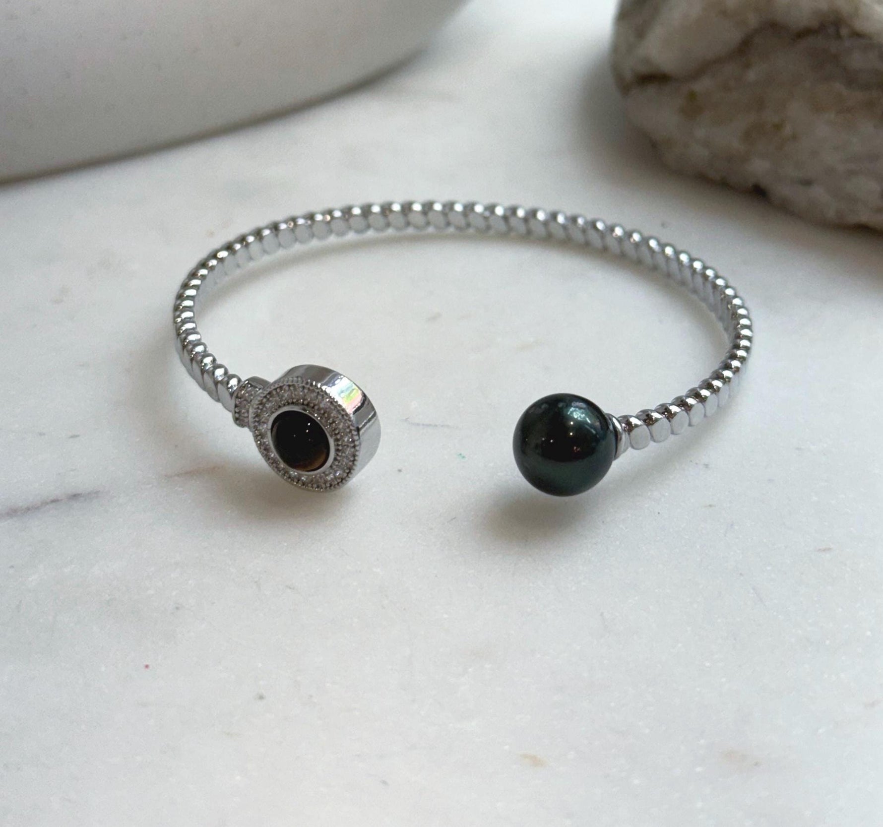 Elly’s Tahitian peacock hunter Ocean Pearl Bracelet: extreme luster mirrored, 9.6mm, adjustable bracelet.