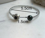 Elly’s Tahitian peacock hunter Ocean Pearl Bracelet: extreme luster mirrored, 9.6mm, adjustable bracelet.