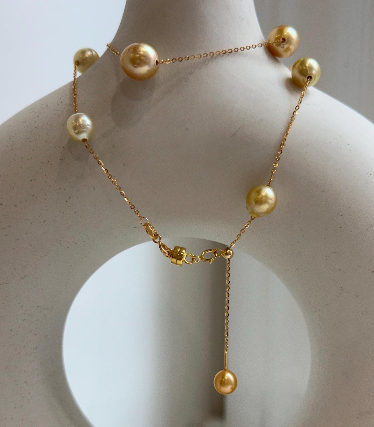 Elly’s 9pcs 8.2-10.1mm South sea golden ocean pearls Satellite Necklace: Extreme luster mirrored, S925 silver satellite necklace, to 17.7”.