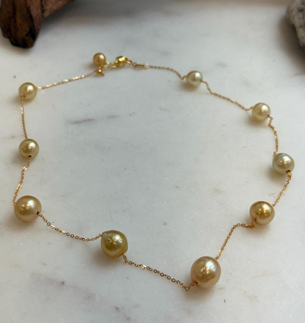 Elly’s 9pcs 8.2-10.1mm South sea golden ocean pearls Satellite Necklace: Extreme luster mirrored, S925 silver satellite necklace, to 17.7”.