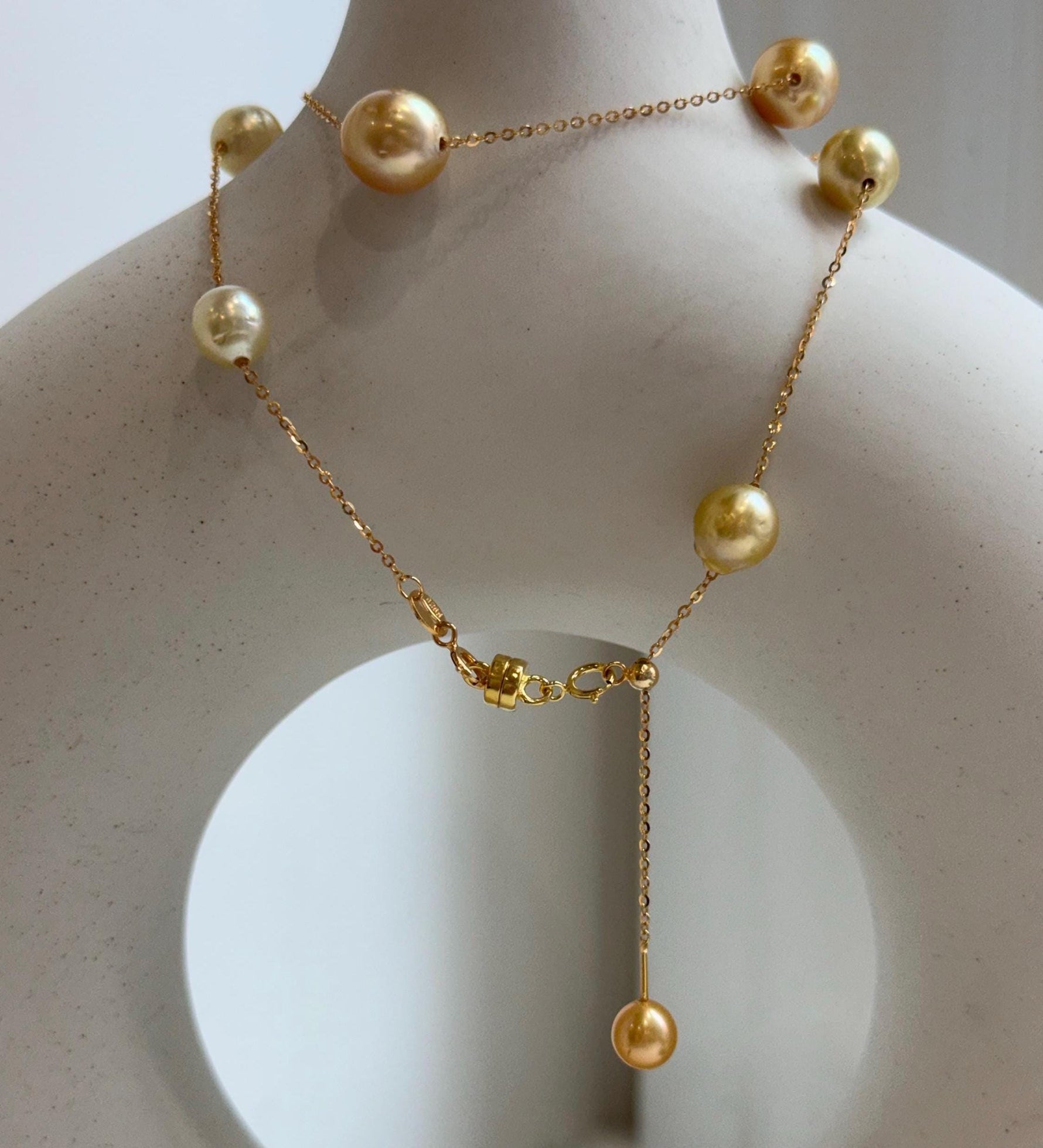 Elly’s 9pcs 8.2-10.1mm South sea golden ocean pearls Satellite Necklace: Extreme luster mirrored, S925 silver satellite necklace, to 17.7”.