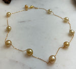 Elly’s 9pcs 8.2-10.1mm South sea golden ocean pearls Satellite Necklace: Extreme luster mirrored, S925 silver satellite necklace, to 17.7”.