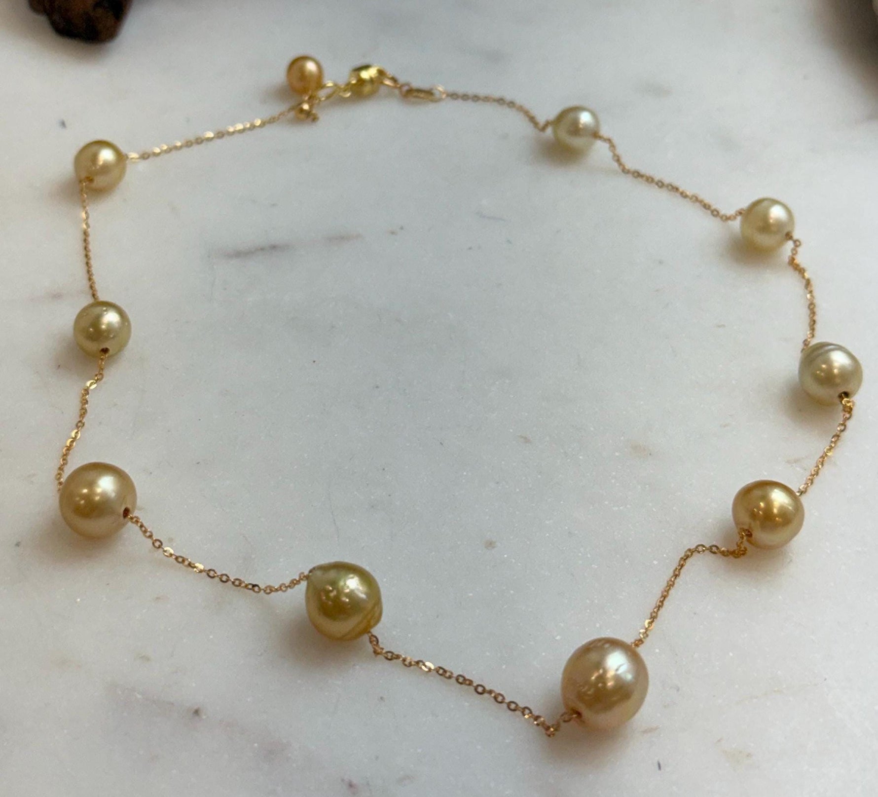 Elly’s 9pcs 8.2-10.1mm South sea golden ocean pearls Satellite Necklace: Extreme luster mirrored, S925 silver satellite necklace, to 17.7”.