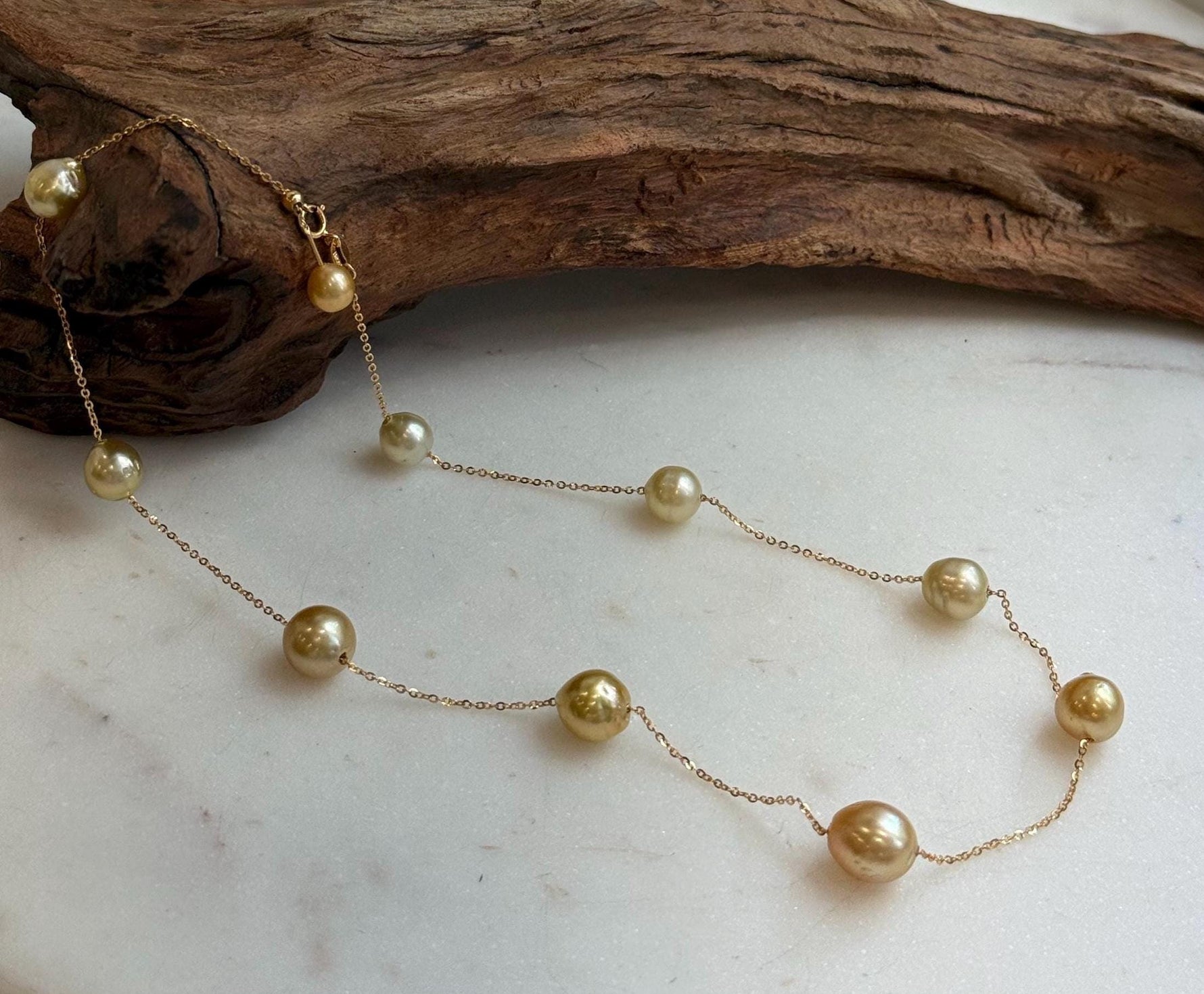 Elly’s 9pcs 8.2-10.1mm South sea golden ocean pearls Satellite Necklace: Extreme luster mirrored, S925 silver satellite necklace, to 17.7”.
