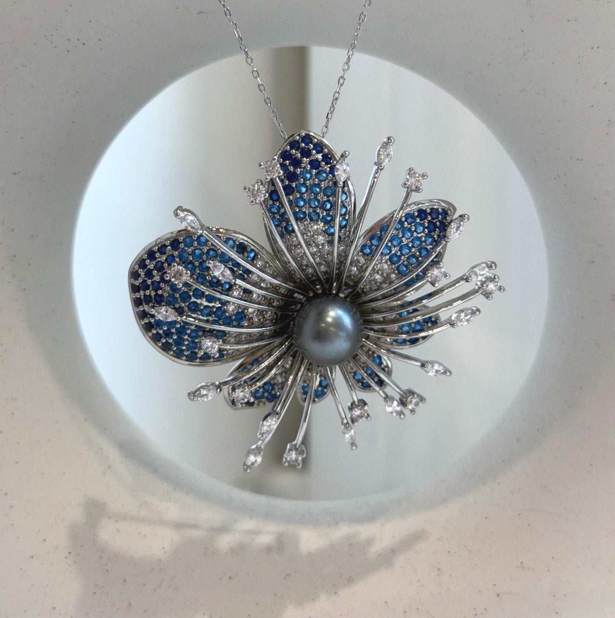 Elly’s Tahitian platinum Ocean Pearl Floral Brooch pendant 2in1: Extreme luster mirrored, 10.3mm, 5cm dia, no chain.