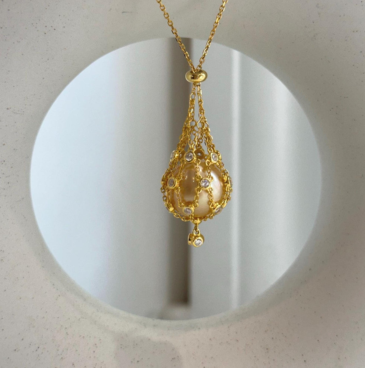 south sea golden ocean pearl net pocket pendant chain set