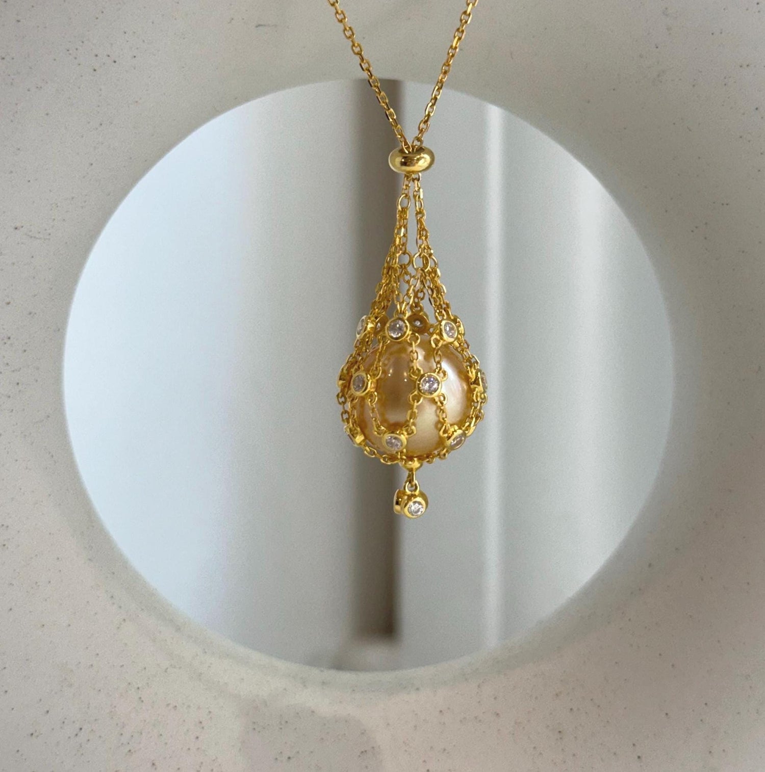 south sea golden ocean pearl net pocket pendant chain set
