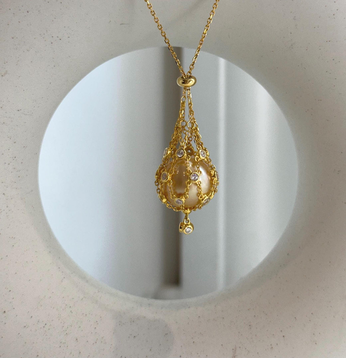 south sea golden ocean pearl net pocket pendant chain set