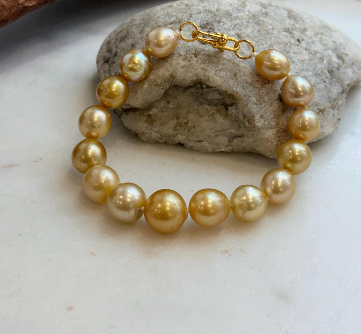 Elly’s 9.8-12.5mm 15pcs Genius South sea golden Ocean Pearls bracelet: Extreme luster, 8.1”, S925 silver bracelet.