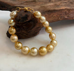 Elly’s 9.8-12.5mm 15pcs Genius South sea golden Ocean Pearls bracelet: Extreme luster, 8.1”, S925 silver bracelet.