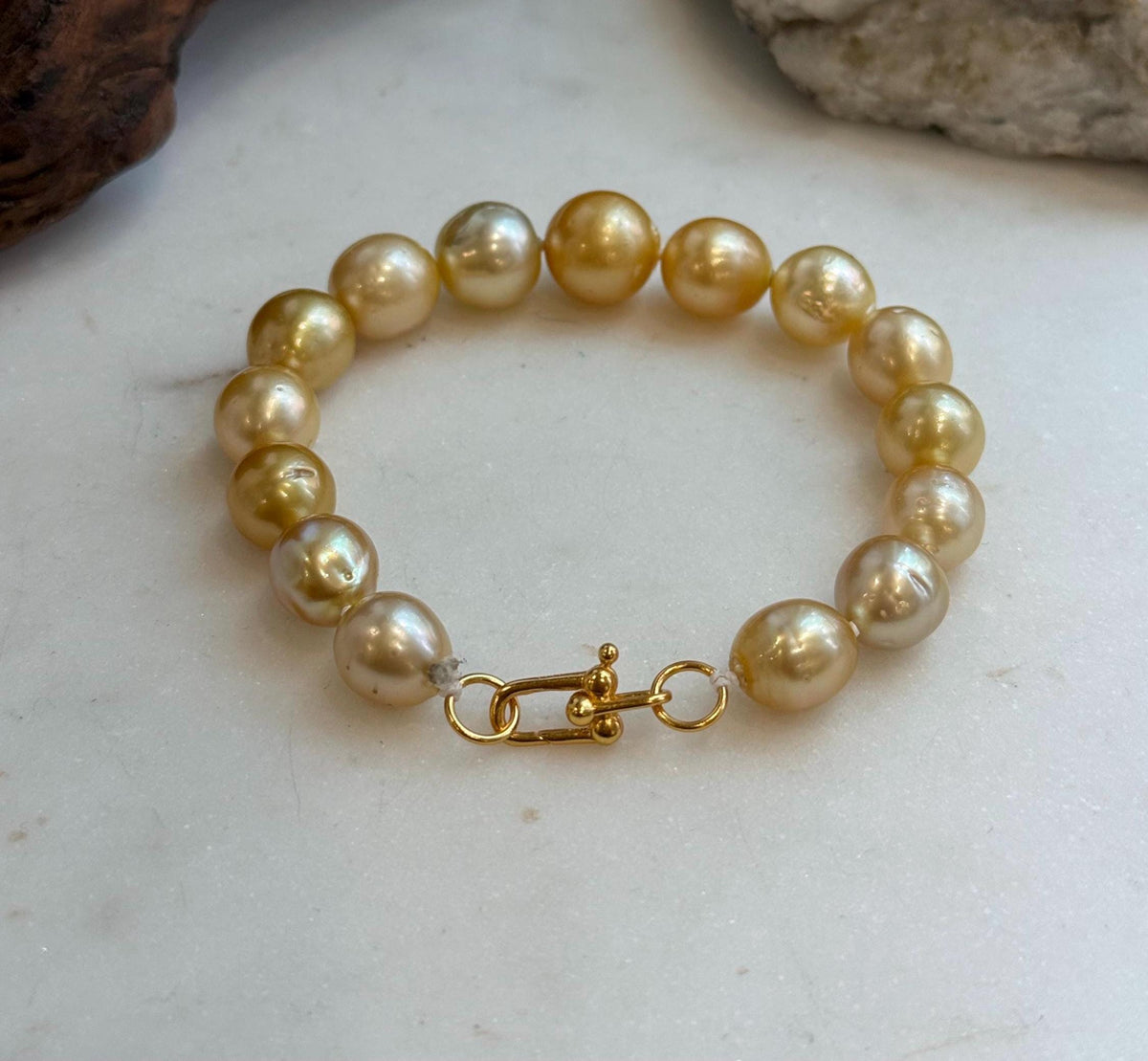 Elly’s 9.8-12.5mm 15pcs Genius South sea golden Ocean Pearls bracelet: Extreme luster, 8.1”, S925 silver bracelet.