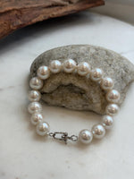 Elly’s 11-12.1mm 16pcs Edison white Pearls bracelet: Extreme luster, 8.1”, S925 silver bracelet.