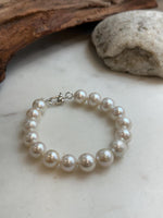 Elly’s 11-12.1mm 16pcs Edison white Pearls bracelet: Extreme luster, 8.1”, S925 silver bracelet.