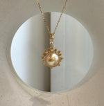 Elly’s 13mm South Sea deep Golden ocean Pearl Floral pendant: Extreme luster mirrored. 2x3cm, S925 silver pendant.