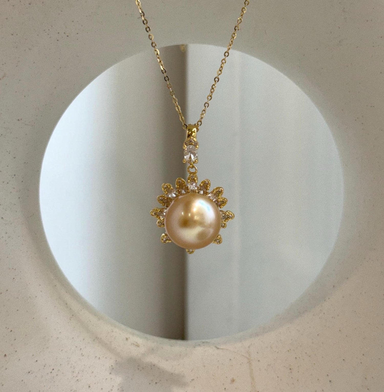 Elly’s 13mm South Sea deep Golden ocean Pearl Floral pendant: Extreme luster mirrored. 2x3cm, S925 silver pendant.