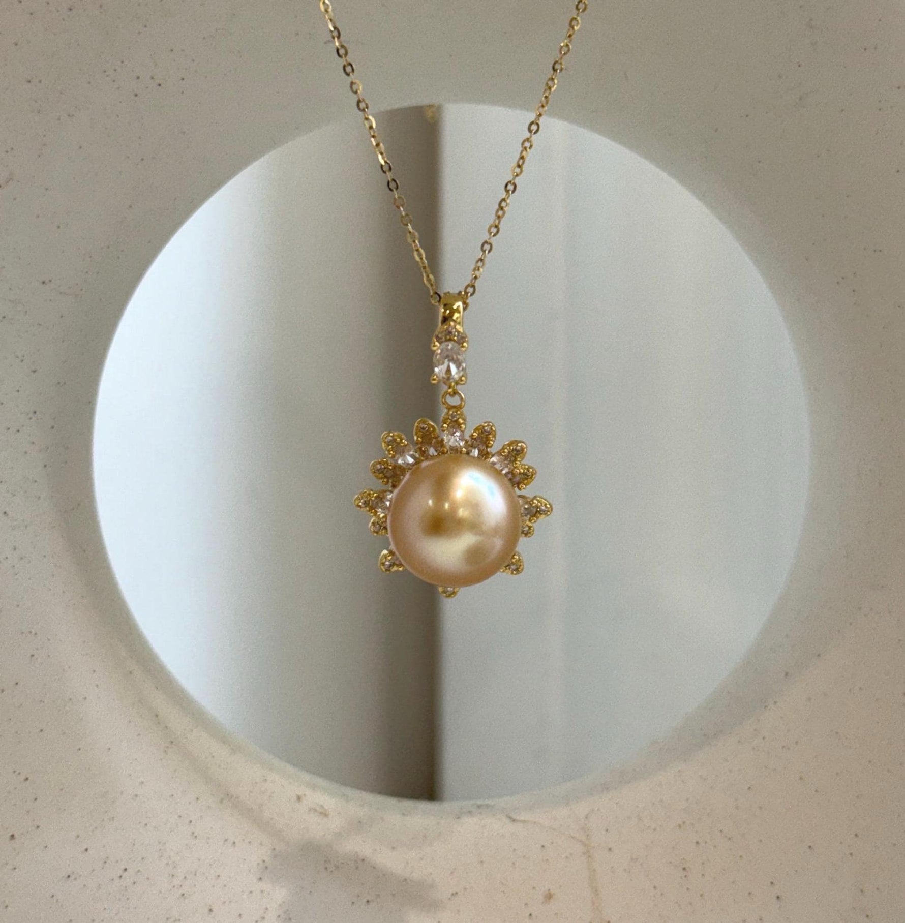 Elly’s 13mm South Sea deep Golden ocean Pearl Floral pendant: Extreme luster mirrored. 2x3cm, S925 silver pendant.